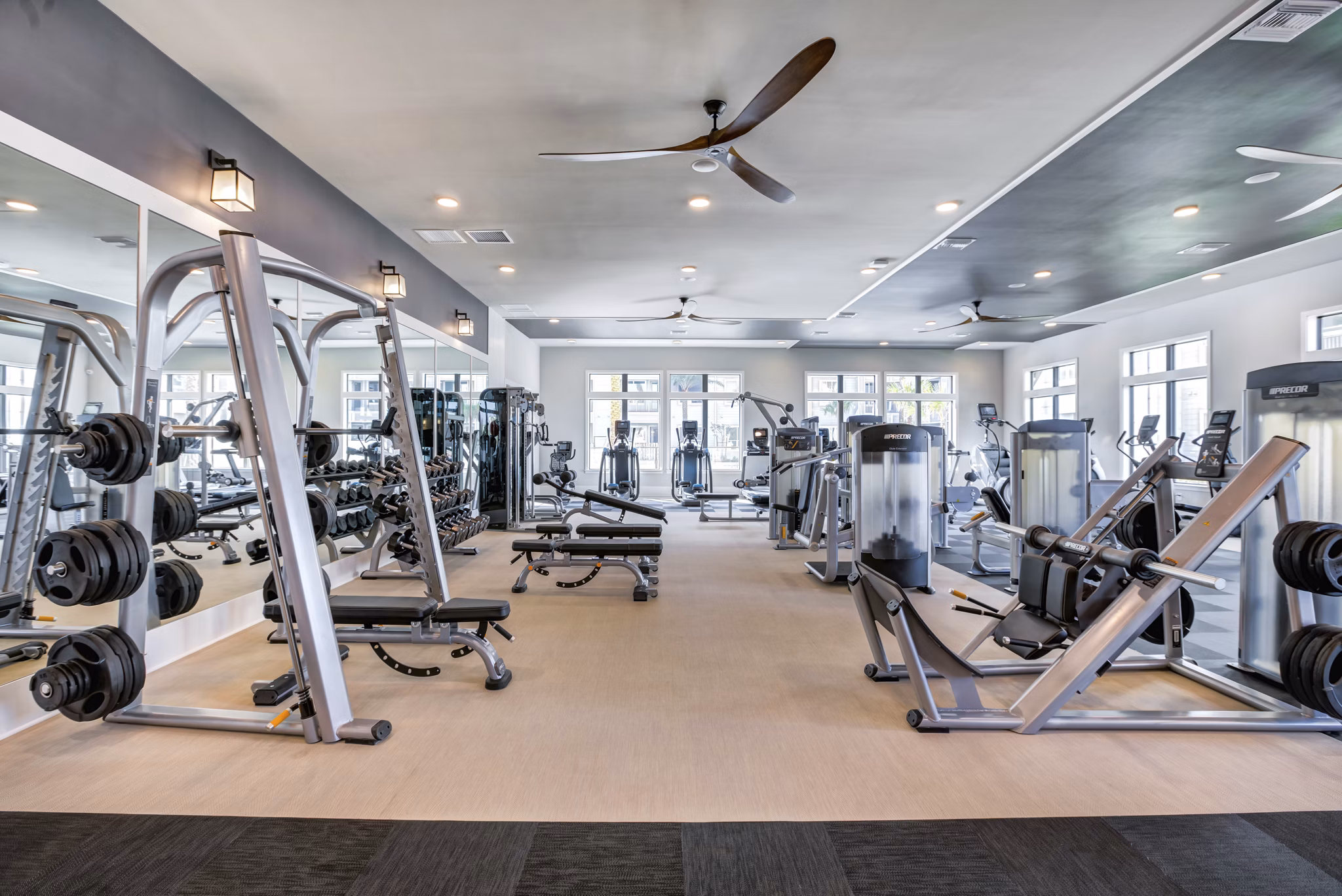 State-of-the-art fitness center with modern equipment at Prime Apartments for luxury wellness lifestyle