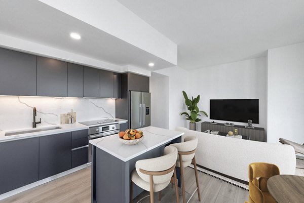 Modern kitchen with stainless steel appliances in GS Gantry Penthouses 2022, luxury apartments