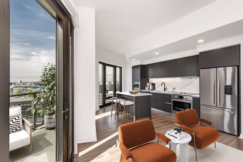 Modern kitchen with stainless steel appliances at The Gantry Apartments in Austin, Texas