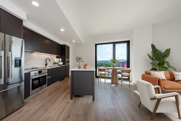 Modern kitchen with stainless steel appliances at The Gantry Apartments, luxury living in the heart of the city