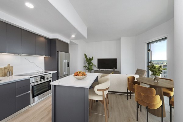Elegant kitchen with modern appliances in GS Gantry Penthouses: Luxurious high-rise apartments in a vibrant 2022 urban setting