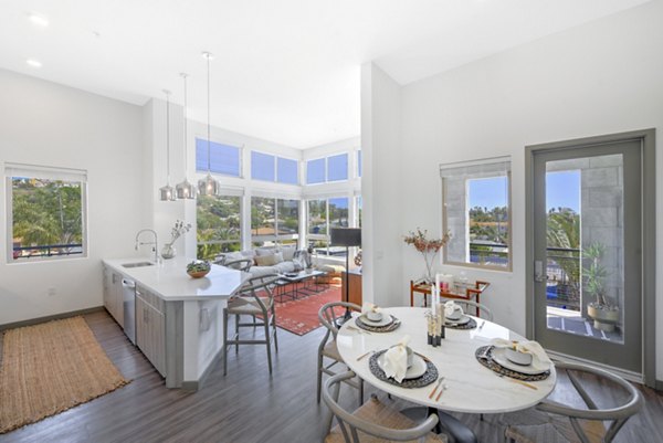 Modern dining area with stylish furnishings in Persea Apartments, a Greystar luxury property