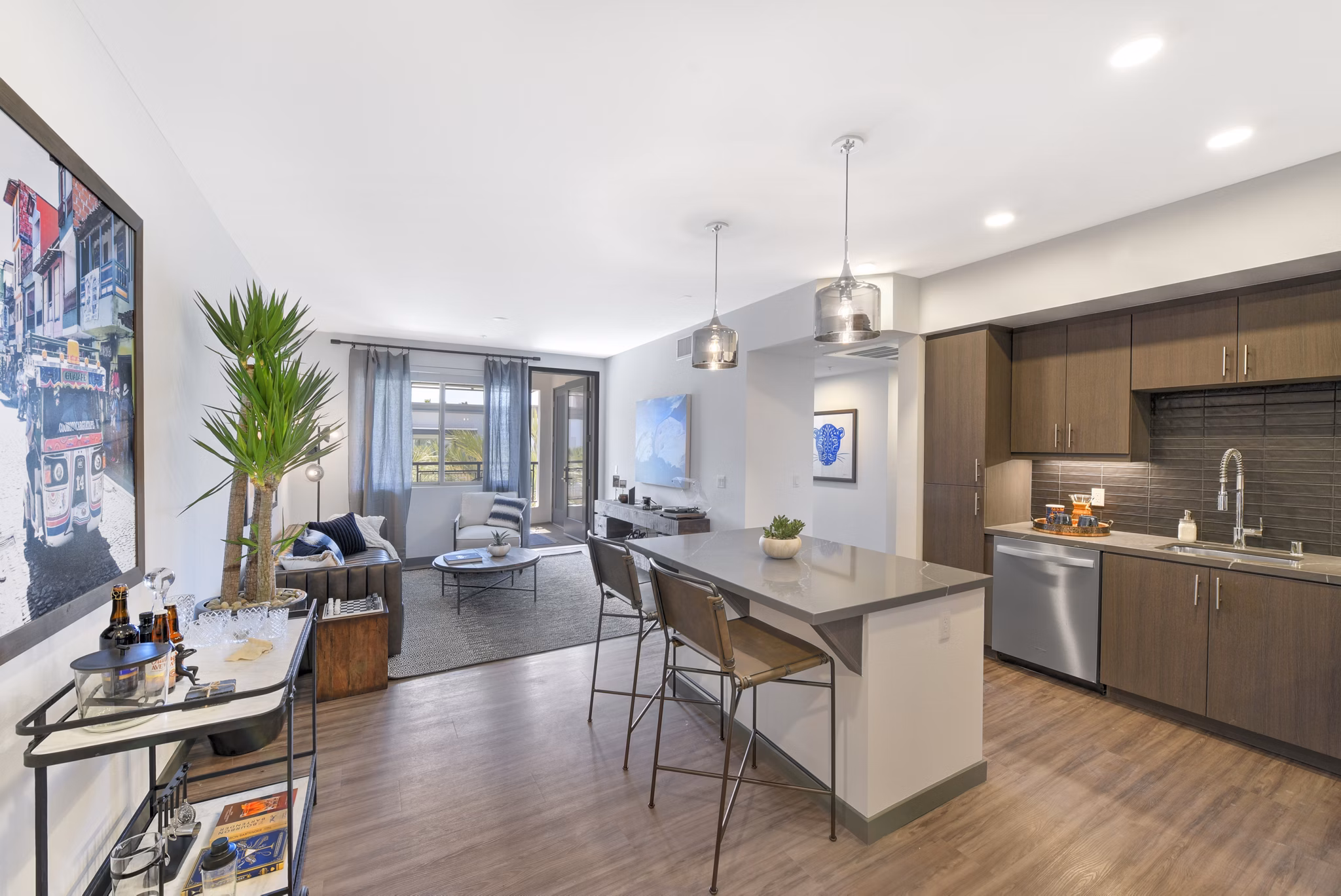 Modern kitchen with stainless steel appliances at Persea Apartments