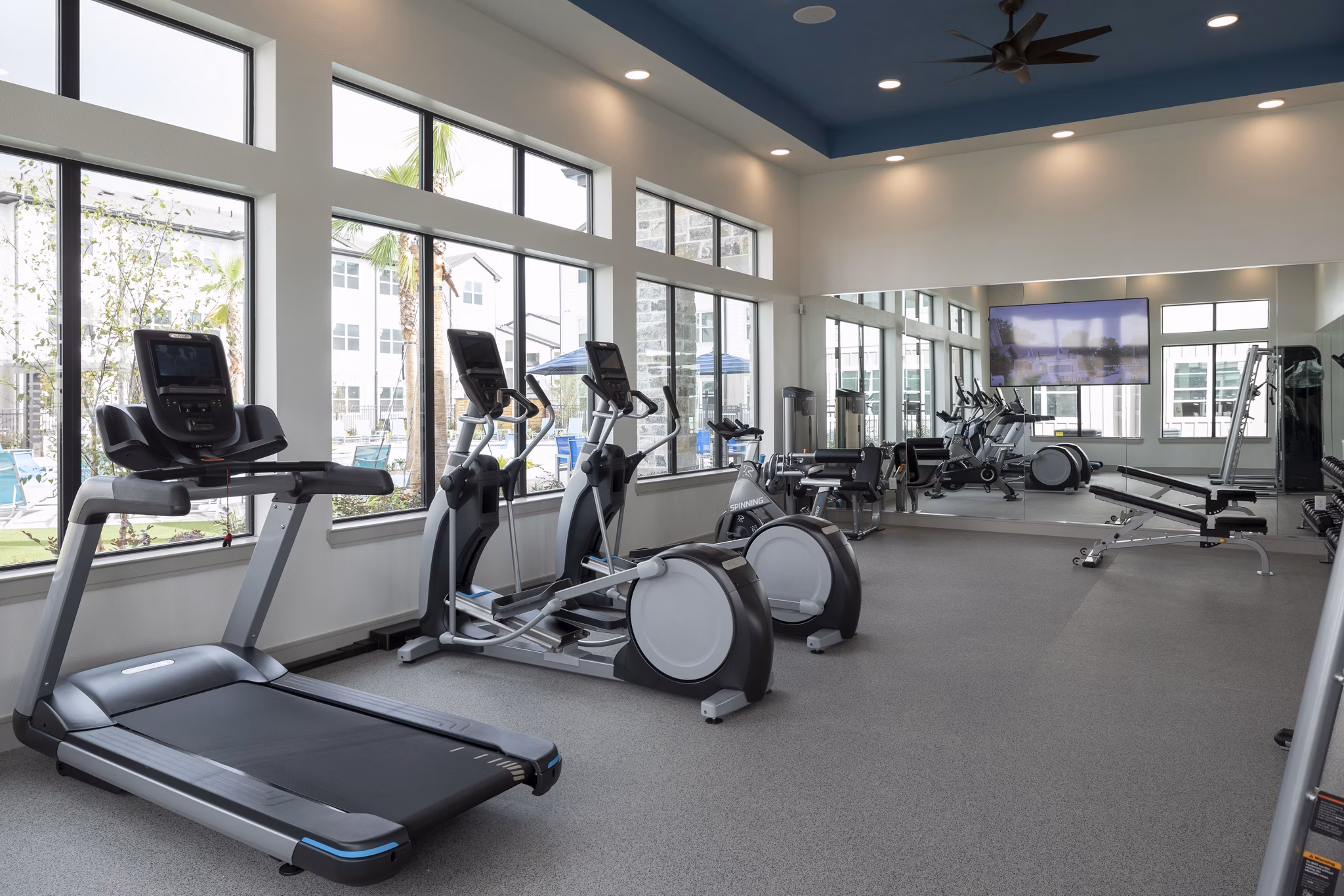 fitness center at Emory West Cypress Apartments