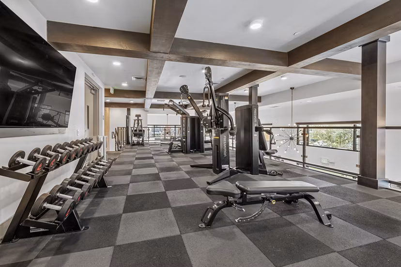 fitness center at The Grove on Main Apartments