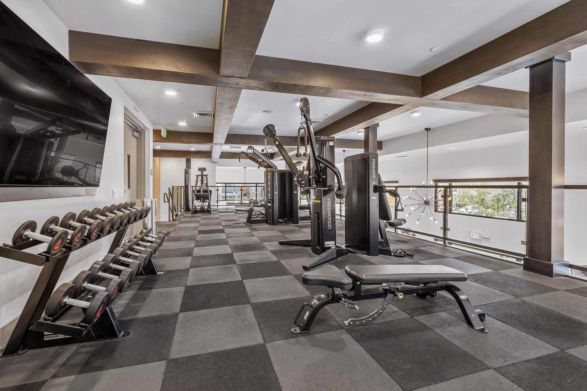 fitness center at The Grove on Main Apartments