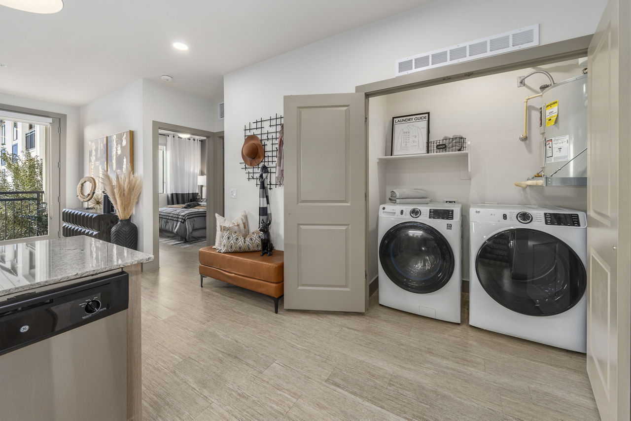 Laundry room at The Grove On Main