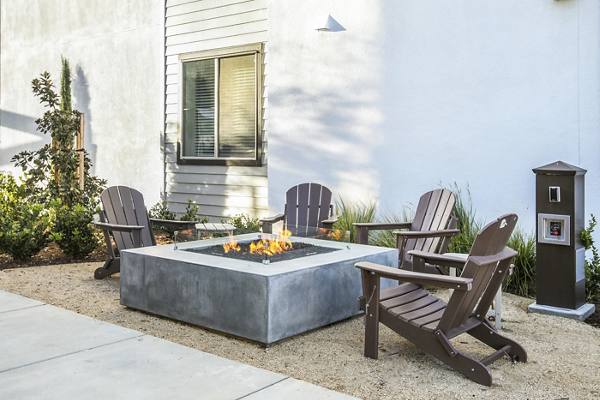fire pit at The Strand Apartments