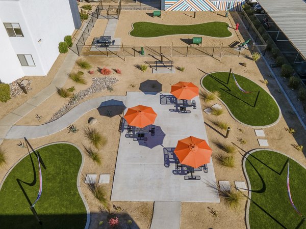 Outdoor patio with modern seating at Vida46 Apartments for relaxing and entertaining