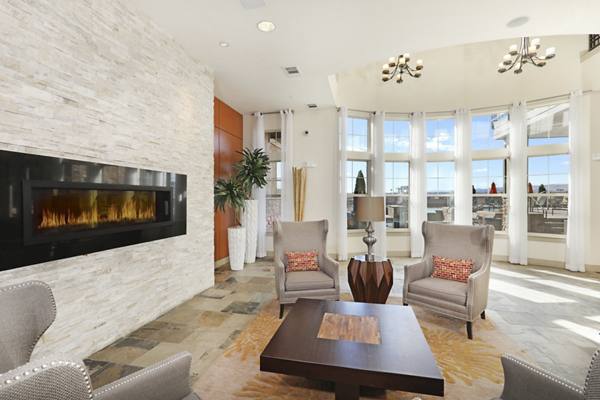 clubhouse fireplace lounge area at at Arvada Station Apartments