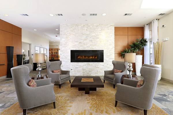 clubhouse fireplace lounge area at Arvada Station Apartments