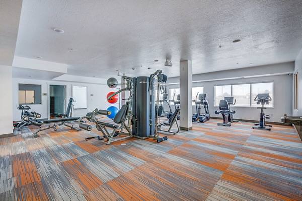 fitness center at 11 West Apartments