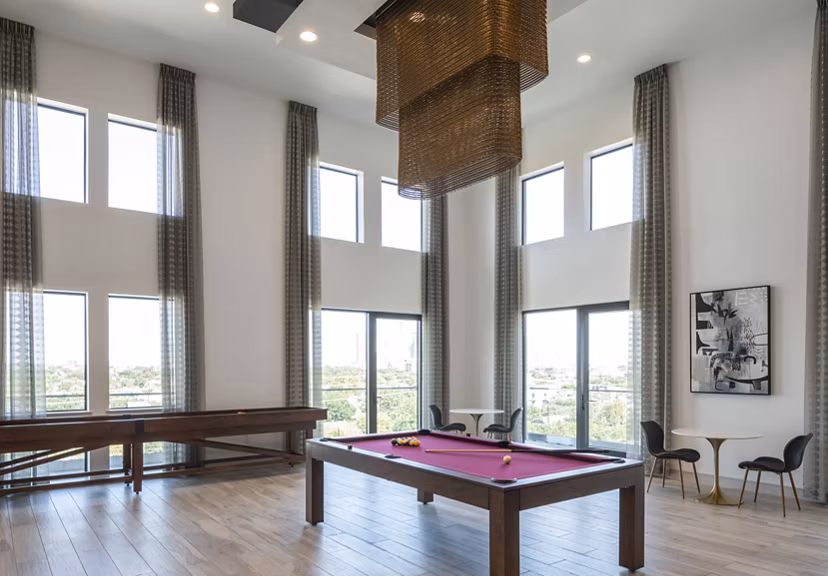 clubhouse game room at Chelsea Museum District Apartments