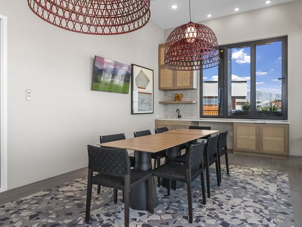Meeting facility with modern design and seating at Upper West Apartments, perfect for business gatherings and community events