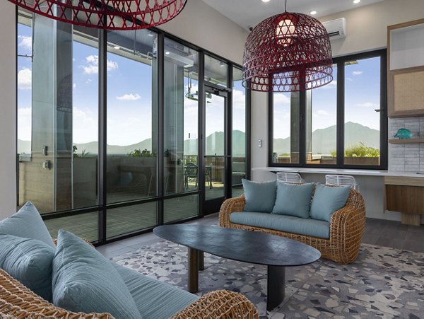Clubhouse with modern decor and seating at Upper West Apartments
