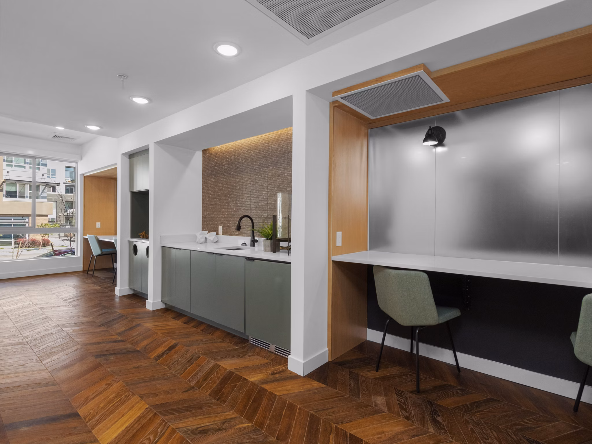Clubhouse featuring modern design and communal seating at Upper West luxury apartments