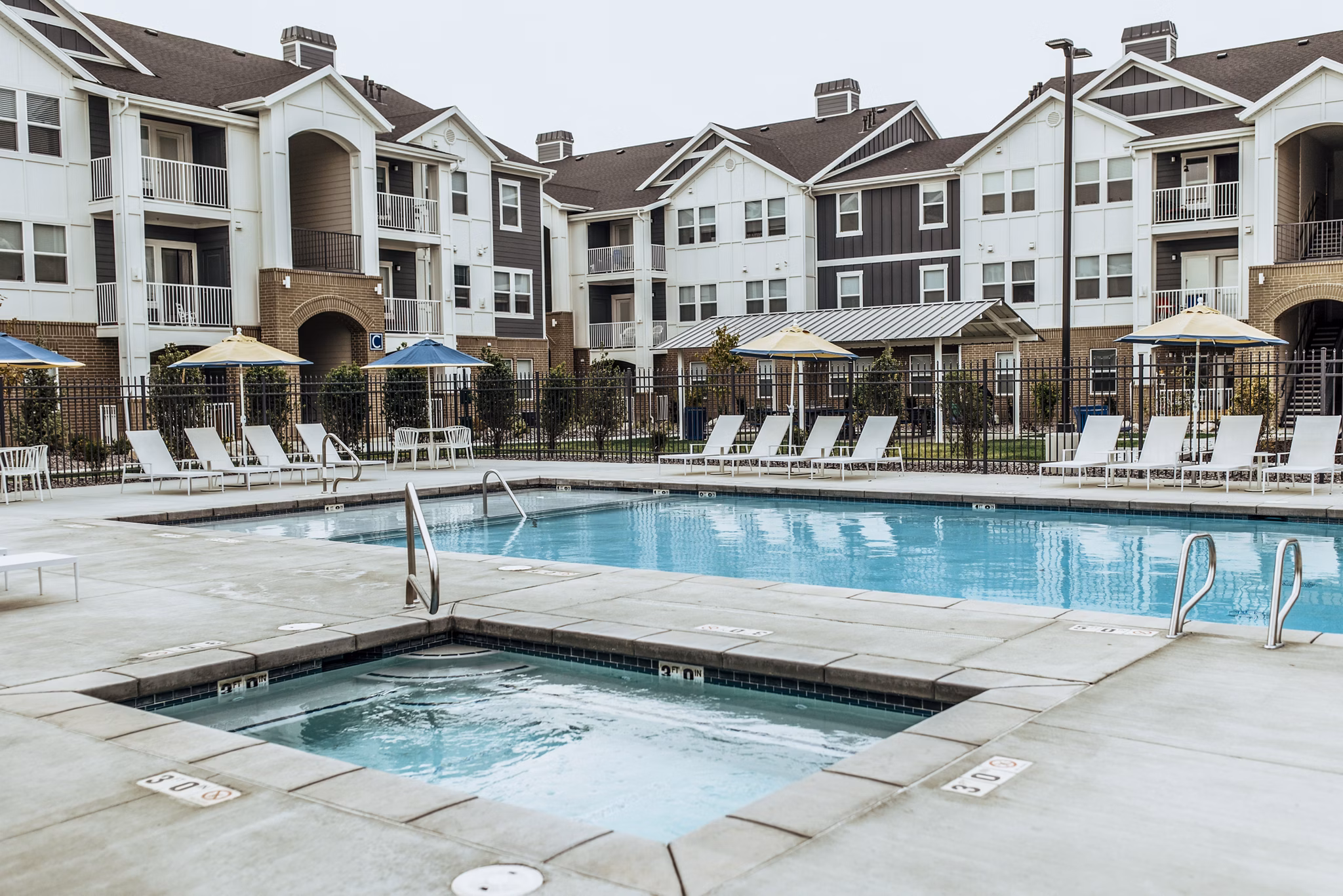 Hot tub oasis at Mirella at Foxboro Apartments with built-in jets and a relaxing ambiance