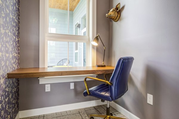 Clubhouse featuring modern design and seating areas at Broadstone Ayrsley Apartments, a Greystar luxury community in Charlotte
