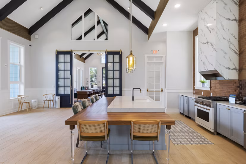 Stylish clubhouse featuring plush seating and modern decor at Broadstone Ayrsley Apartments