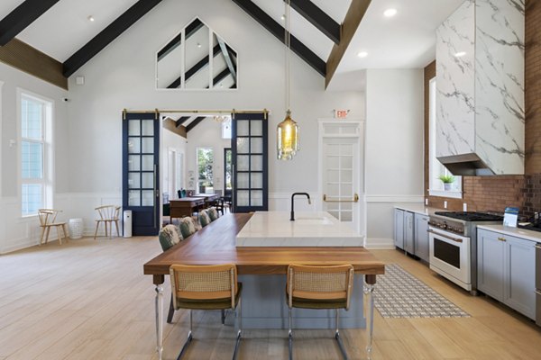 Stylish clubhouse featuring plush seating and modern decor at Broadstone Ayrsley Apartments