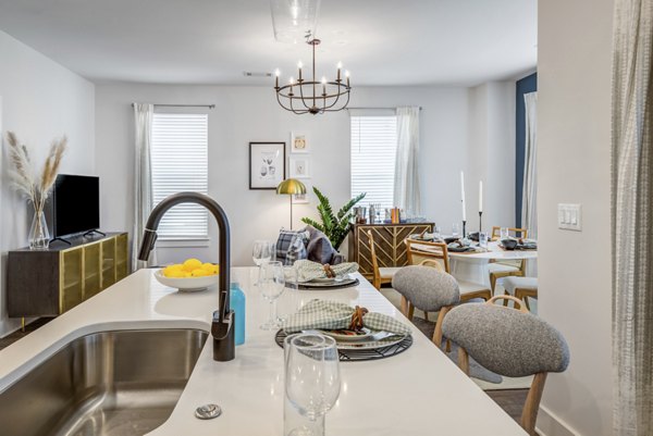 Dining room featuring elegant decor and seating in Broadstone Ayrsley Apartments