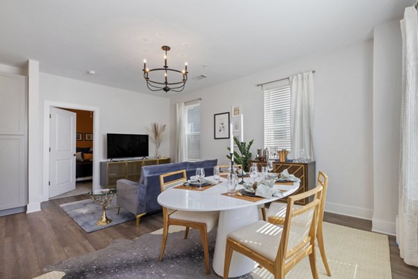 Dining room featuring contemporary design and chic lighting at Broadstone Ayrsley Apartments luxury living spaces