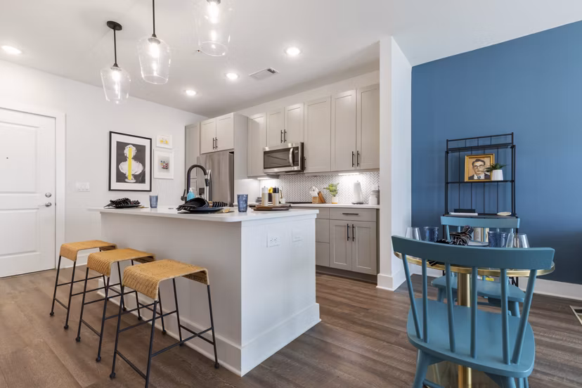 Modern kitchen with stainless steel appliances at Broadstone Ayrsley Apartments