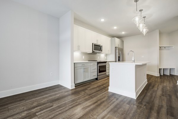 Modern kitchen featuring stainless steel appliances in Broadstone Ayrsley Apartments