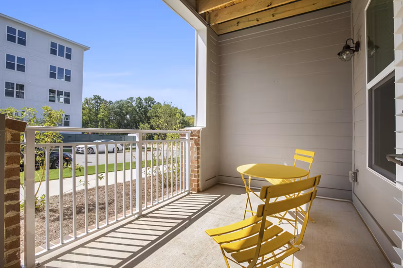 Expansive patio area with modern seating at Broadstone Ayrsley Apartments in a vibrant neighborhood