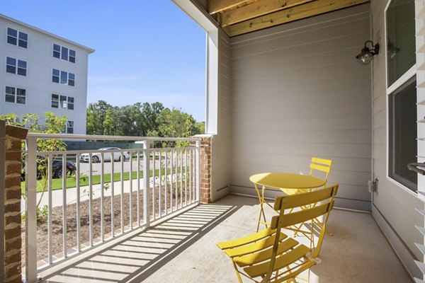 Expansive patio area with modern seating at Broadstone Ayrsley Apartments in a vibrant neighborhood
