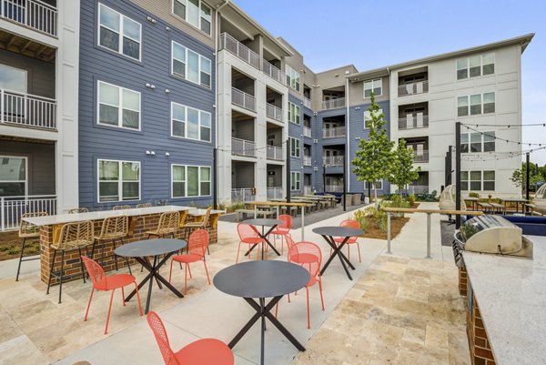 Recreational area with pool tables at Broadstone Ayrsley Apartments
