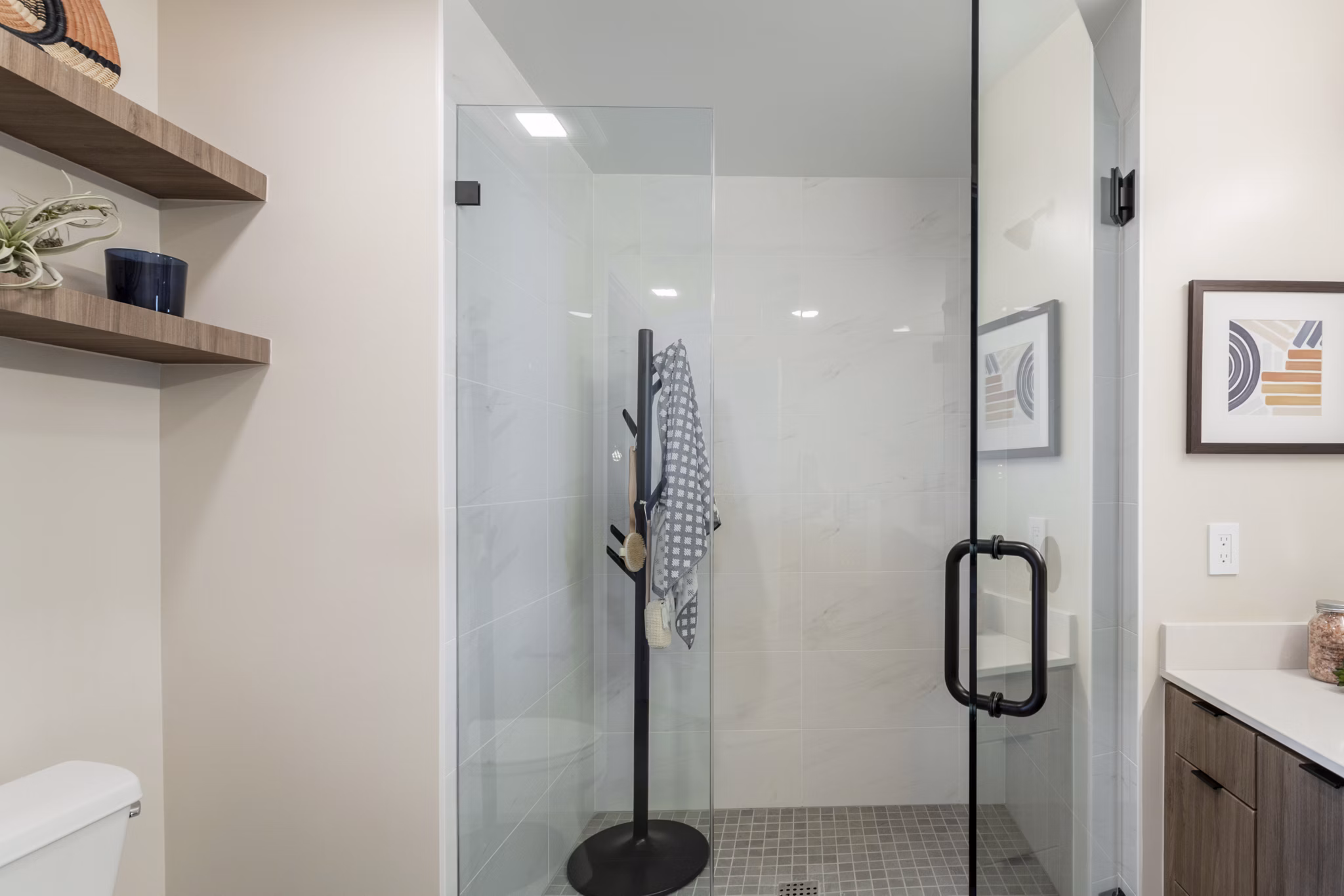Modern bathroom with marble countertops at Prado West Apartments, offering luxury living in a prime location