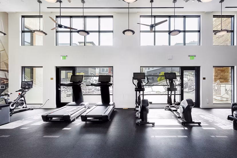 State-of-the-art fitness center featuring modern equipment at Prado West Apartments, ideal for active lifestyles