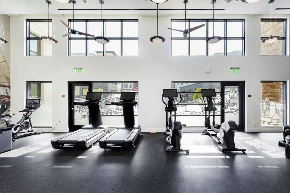 State-of-the-art fitness center featuring modern equipment at Prado West Apartments, ideal for active lifestyles