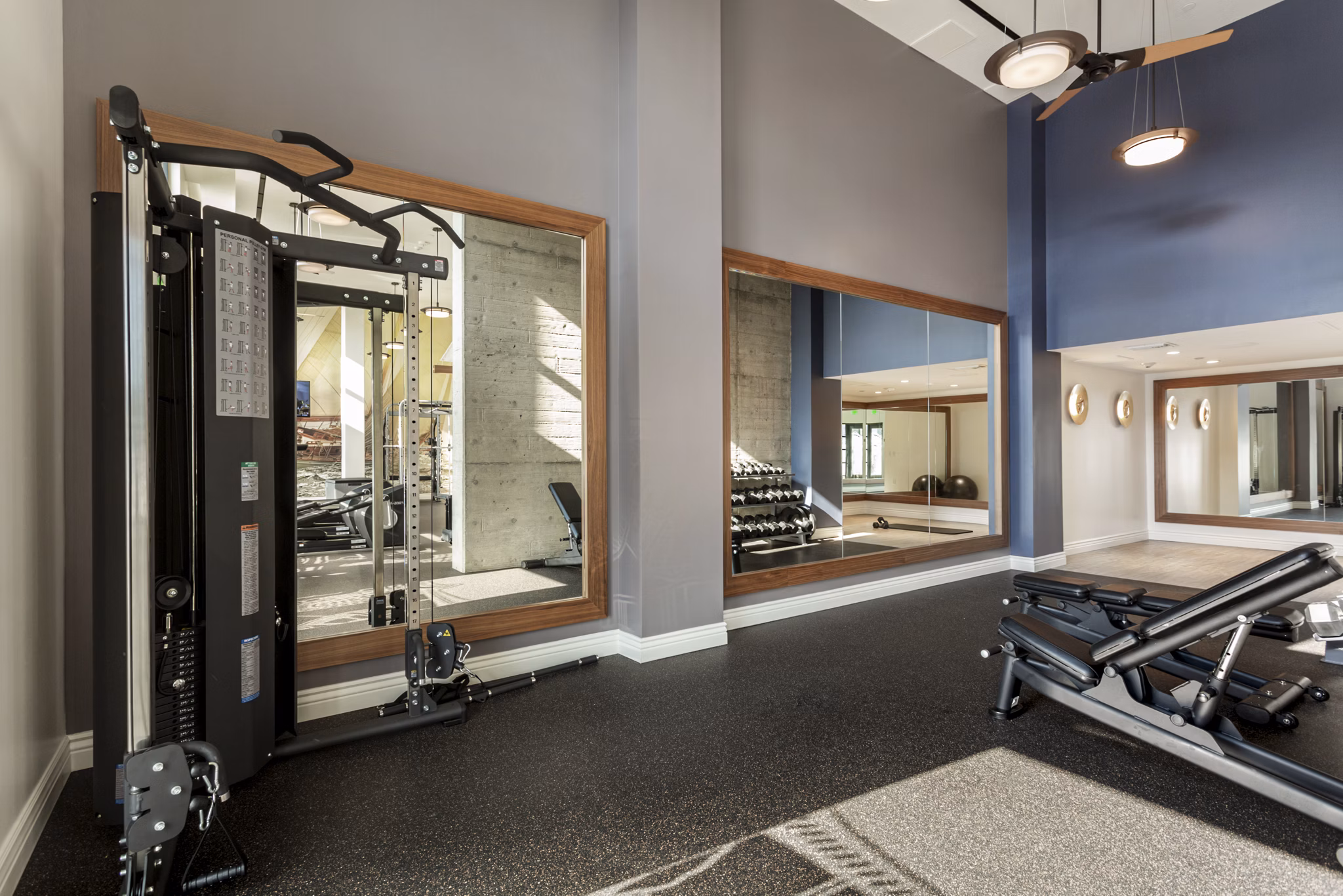 State-of-the-art fitness center featuring cardio machines at Prado West Apartments