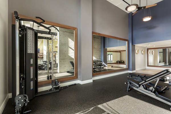 State-of-the-art fitness center featuring cardio machines at Prado West Apartments