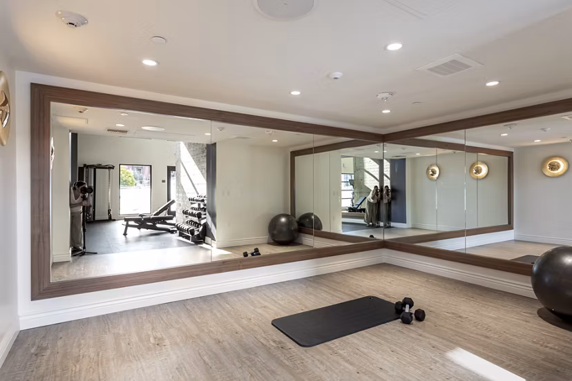 Fitness center at Prado West Apartments with modern equipment and spacious areas for exercise routines