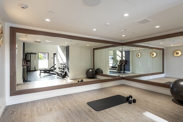 Fitness center at Prado West Apartments with modern equipment and spacious areas for exercise routines