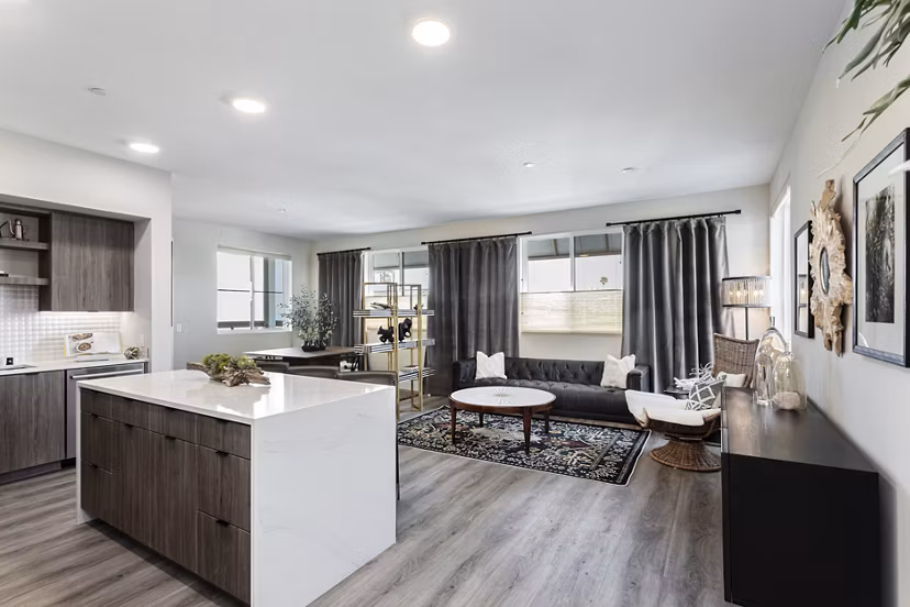 Modern kitchen with sleek countertops and stainless steel appliances at Prado West Apartments