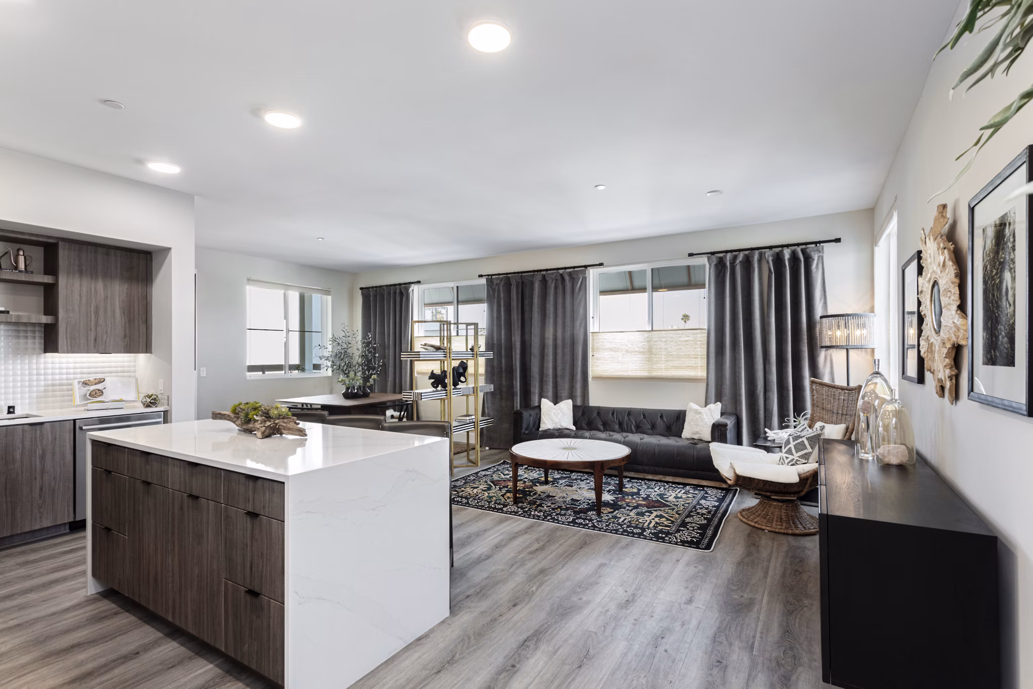 Modern kitchen with sleek countertops and stainless steel appliances at Prado West Apartments