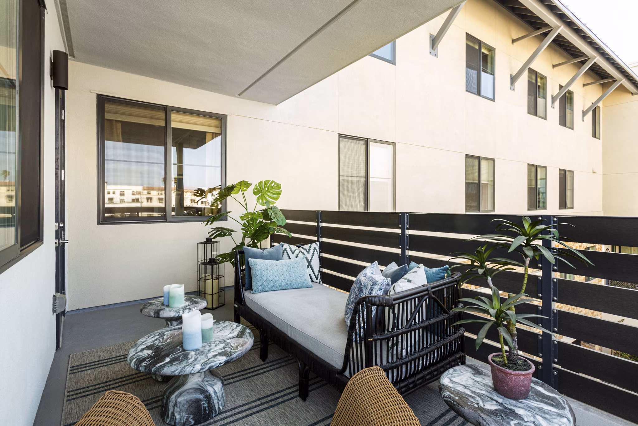Elegant balcony with cityscape views at Prado West Apartments