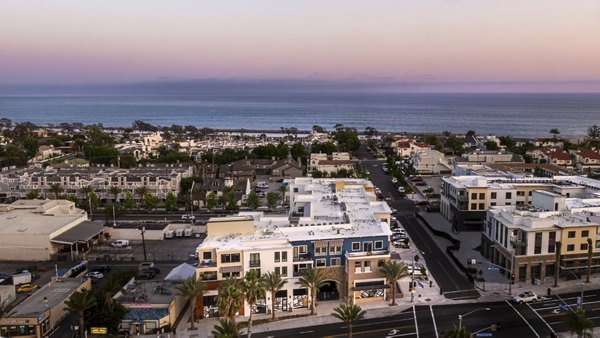 Prado West Apartments: Stunning view of luxury apartment complex in lively city setting