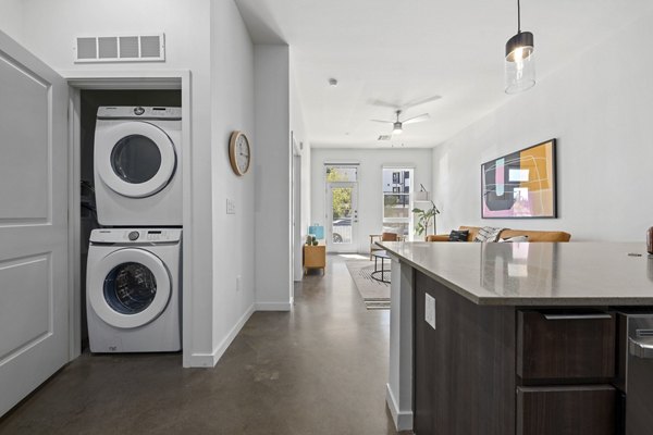 kitchen/laundry area at The Battery Apartments