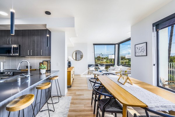 Dining room with modern decor at Exhibit at J Town Apartments