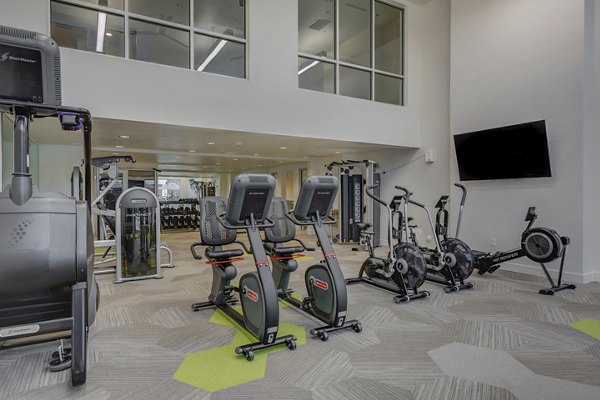 fitness center at Harmony3900 Apartments