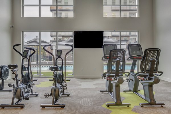 fitness center at Harmony3900 Apartments