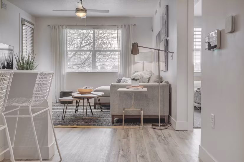 Spacious living room with modern decor in Harmony3900 Apartments, luxury rental apartments