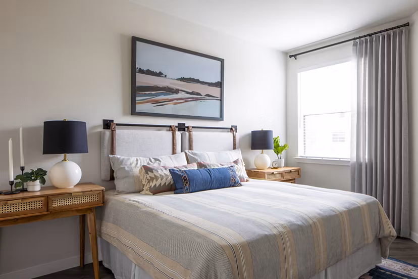 Cozy bedroom with modern furnishings at Bellrock Memorial Apartments