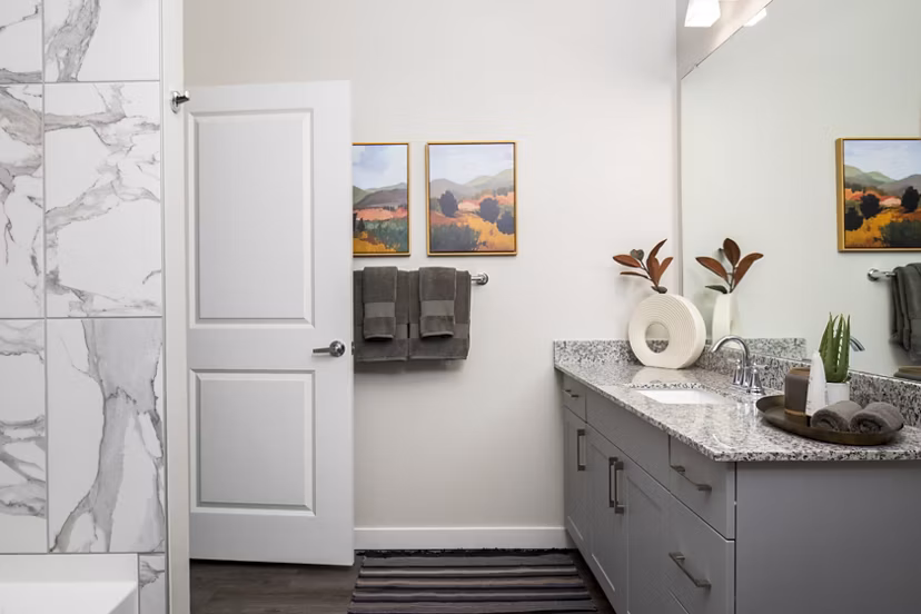 Luxurious bathroom with modern fixtures at Bellrock Memorial Apartments