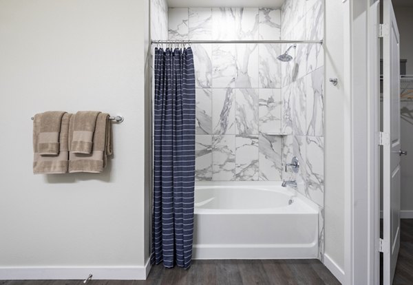 Bathroom with modern fixtures and sleek design at Bellrock Memorial Apartments